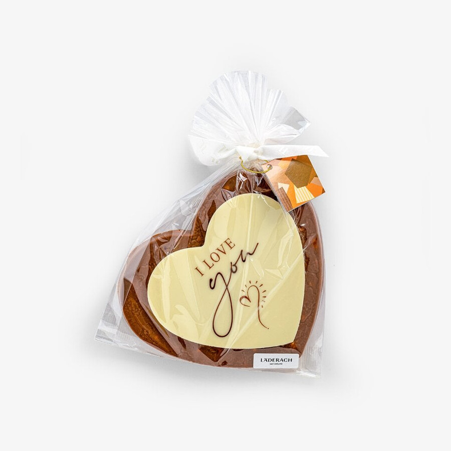 herzförmige grußkarte „ich liebe dich – ein romantischer genuss aus schweizer milchschokolade mit haselnüssen