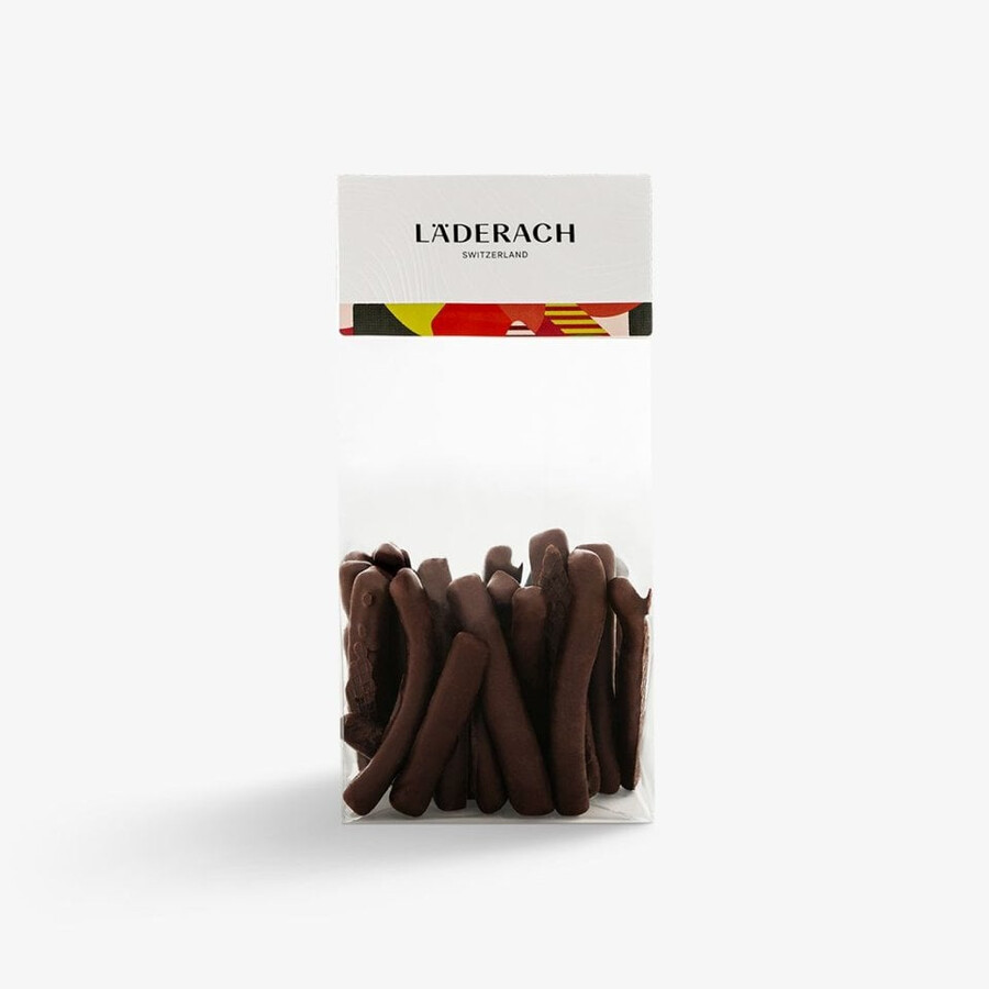 snacking orange sticks kandierte orangenschale in zartbitterschokolade – veganer genuss aus der schweiz