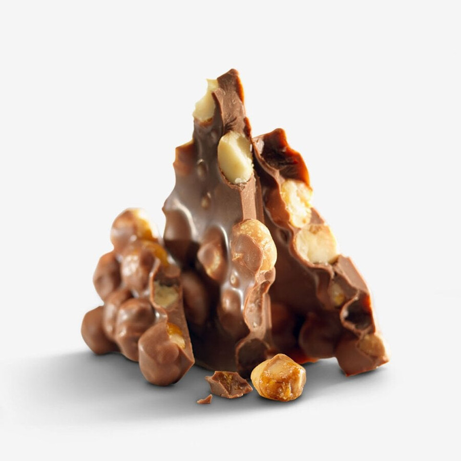 frischschoggi macadamia milchschokolade gourmet-milchschokolade mit gerösteten karamellisierten macadamianüssen