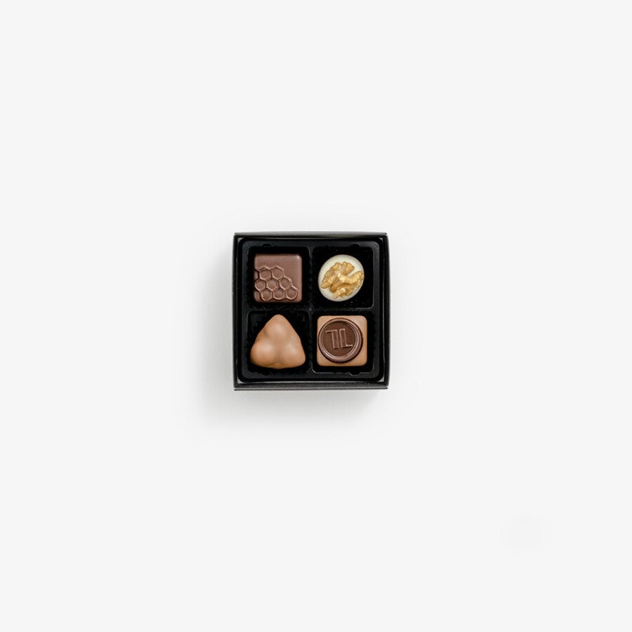 pralinenauswahl 4er-packung exquisite auswahl an honig-nougat